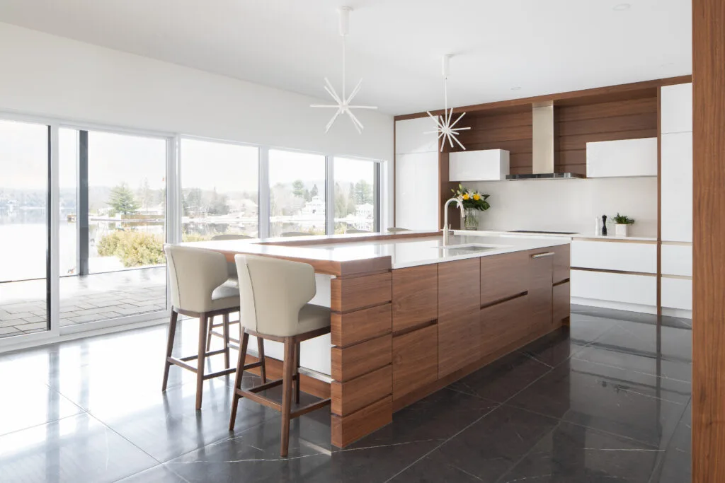 Custom kitchen design with walnut wood, lacquered surfaces, abundant natural light