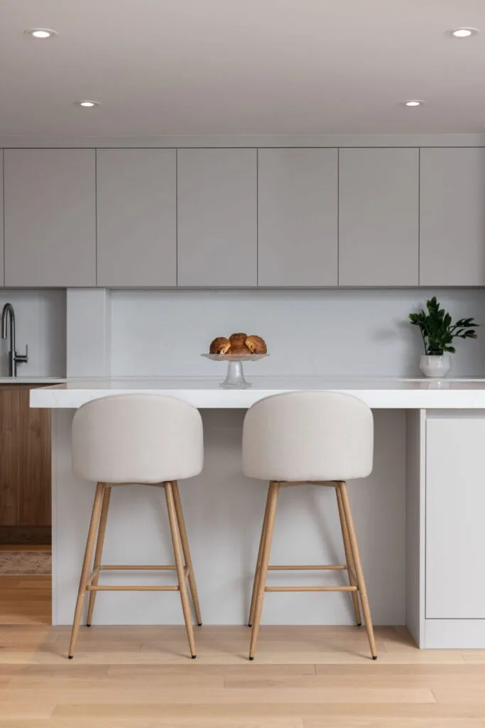 Contemporary condominium kitchen renovation featuring high-end finishes, custom storage solutions, and premium materials for a functional and stylish design.