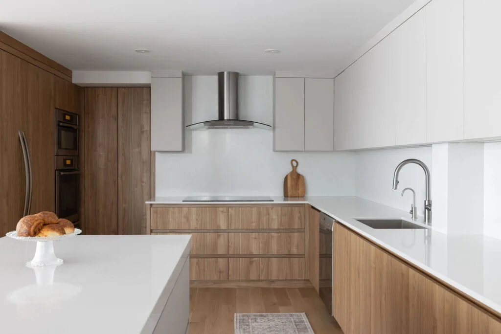 The tailored storage solutions blend seamlessly into the space, enhancing functionality while delivering a clean, sophisticated, and contemporary aesthetic.